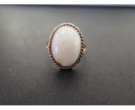 A 9ct gold opal cabochon dress ring - Hallmarked Sheffield - Ring size L 1/2 - Weight approx 5.5gms
Condition Report: Good to