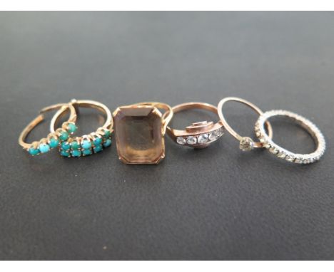 Two un hallmarked gold dress rings one set with smoky quartz the other with turquoise ring size K both tested as 18ct - Toget