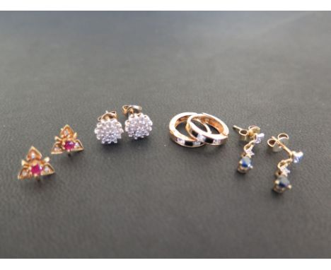 Four pairs of earrings - To include sapphire and diamond ear pendants - Stamped 585 - Length 1.5cms - Weight approx 1.5gms - 