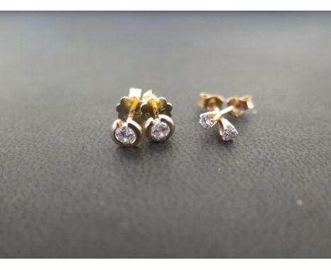 A pair of brilliant-cut diamond ear studs - Estimated total diamond weight 0.30ct - Estimated I-J colour, SI1-SI2 clarity - S