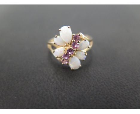 A 9 ct gold opal and pink stone ring, possibly pink sapphire - Weight approx. 2.4 grms - Ring size M 
Condition report: Stone