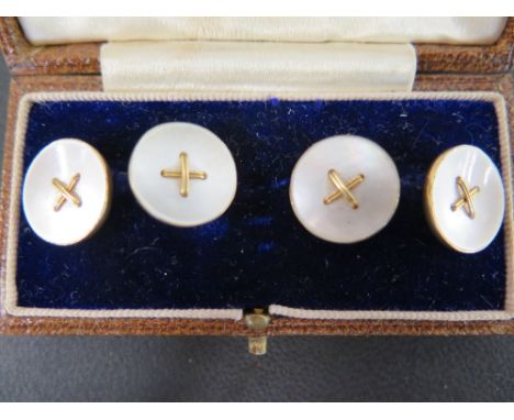 A boxed pair of early 19th century 18 ct and mother of pearl button cufflink's - stamped 18 to the underside of each - Diamet