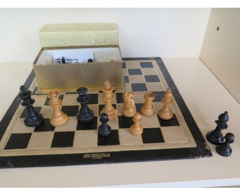 A 1900's Jaques folding chess board and a Staunton pattern wooden chess set - Height 76 mm
Condition report: Some slight dama