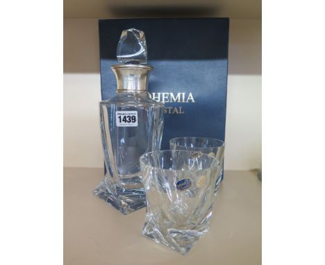 A Bohemian crystal decanter with silver collar and two Bohemian crystal tumblers 
Condition report: Chip to decanter stopper,