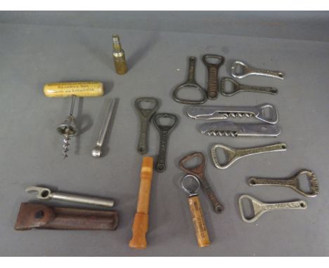 A collection of advertising corkscrews and bottle openers - to include White Label whisky bottle shape boxwood, two part cork