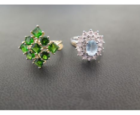 Two gem-set cluster rings - Hallmarked Birmingham - Ring size K - Weight approx 6.0gms
Condition Report: Good - With light sc