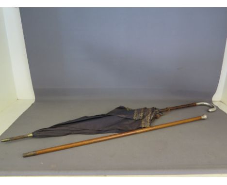 An antique parasol with silver handle marked ZB London - 89 cm together with a silver top walking stick - 70 cm
