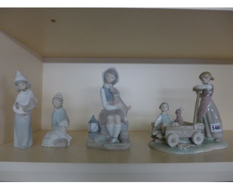 A collection of four pieces of Lladro to include a girl with a cart containing a child and a dog and three pieces with matt f
