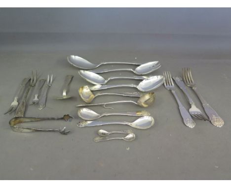 A selection of Norwegian silver flatware including a ladle, sugar tongs, two serving spoons, large spoon and serving fork, sm