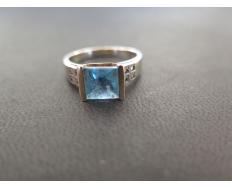 A blue-gem and diamond dress ring - Believed to be topaz - Stamped 10K - Ring size Q 1/2 - Weight approx 5.3gms
Condition Rep