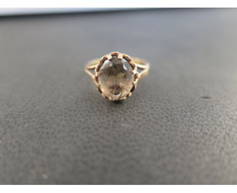 A 9ct gold smokey quartz single-stone ring - Hallmarked Birmingham - Ring size L - Weight approx 2.4gms
Condition Report: Goo