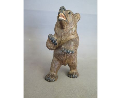 A 19th century Black Forest Bear with glass eyes - Height 13 cm 