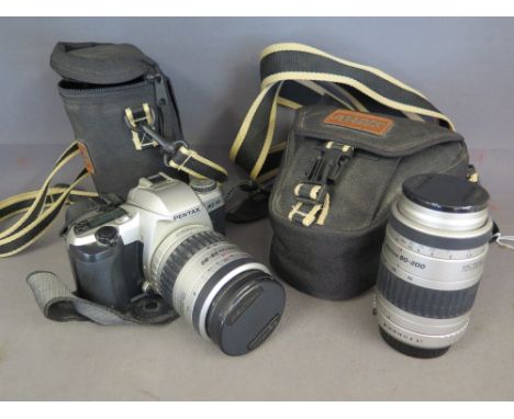 A Pentax MZ 30 SLR Camera serial no. 3421890 together with a SMC Pentax 28 - 80 mm- 1.35 - 5.6 lense and a SMC Pentax 1:47 - 