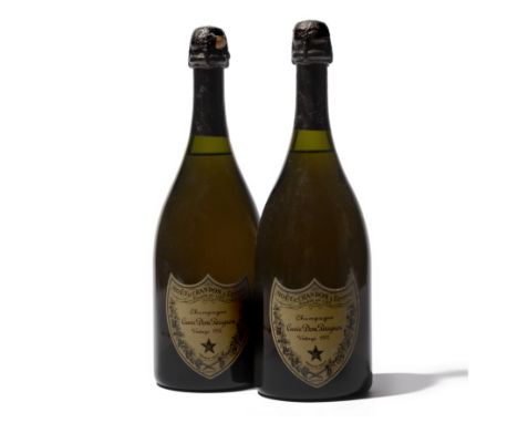 2 bottles 1970 Dom Perignon Champagne. Moet et Chandon One torn foil, cork partially exposed. Levels 1.5cms below the foils L