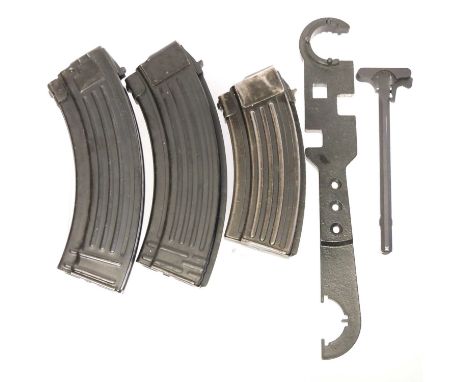 Three AKM / AK47 magazines, also an AR-15 armourers wrench and a Tbar cocking handle. 31cm long 