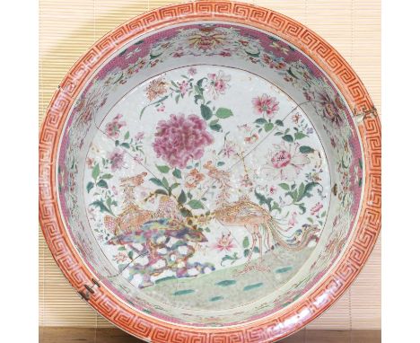 A Chinese famille rose basin,Guangxu (1875-1908), of circular form with a flat everted rim, the centre painted with phoenixes