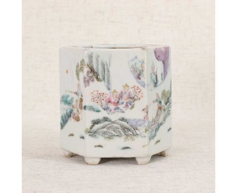 A Chinese famille rose brush pot,Tongzhi (1862-1874), of hexagonal form on bracket feet, painted with figures in a landscape,