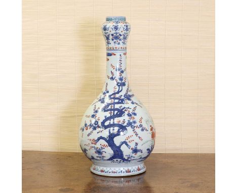 A Chinese blue and white vase,Republic period (1912-1949), the pear-shaped body rising from an everted foot to a garlic mouth