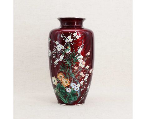 A Japanese cloisonné vase,early 20th century, of tapering form, enamelled with two birds among a blossoming prunus tree by ba