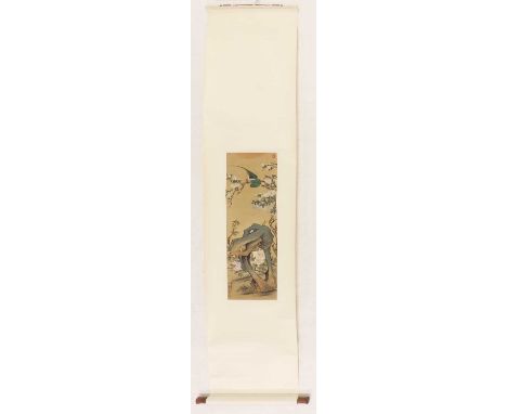 A Chinese hanging scroll,20th century, painted with a parrot standing on a blossoming magnolia tree above a rock, inscribed w