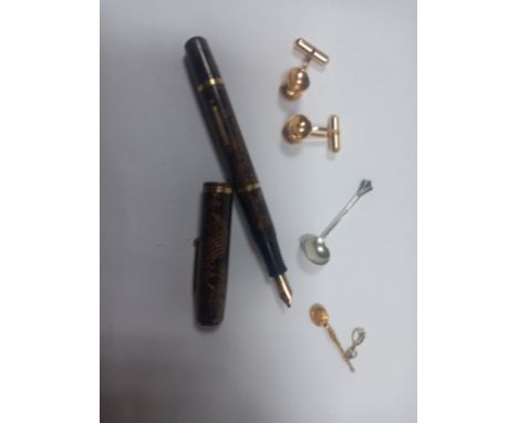 A 9ct gold spoon charm, a hallmarked silver spoon, a vintage Waterman's fountain pen with a 14ct gold nib, and a pair of cuff