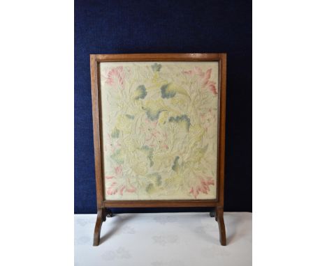 A C.1900 tapestry panel firescreen, glazed. H.78 W.56cm