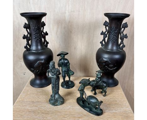 A collection of four Chinese bronze figures and a pair of Japanese bronze vases. H.28cm 