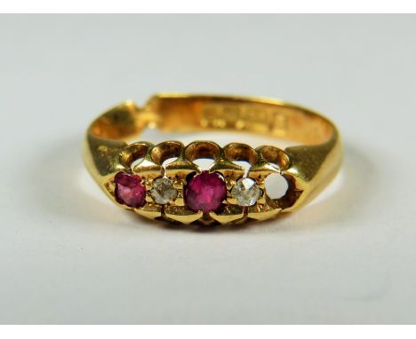 18ct Yellow Gold Ring set with two Rubies and Two Diamonds. (one ruby missing, see photos) Poor repair to rear of ring.   2.6