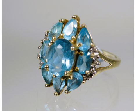 Very Pretty 9ct Yellow Gold Ring set with multiple Aqua in an oval shield shape.  Finger size 'L-5'   3.5 g