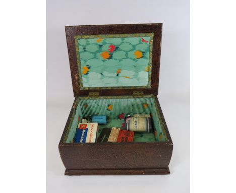 Vintage storage box and contents of vintage first aid items, 31.5cm long 25cm wide 14.5cm tall