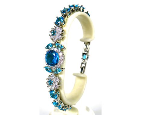 925 Silver Tennis Bracelet, 8 inches with detachable extension. Set with Synthetic Opal &amp; Topaz.   as new and unused cond