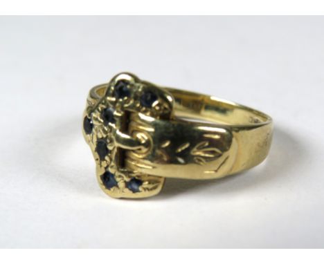 9ct Yellow Gold Belt Buckle Ring set with (worn) sapphires.   Finger size 'J'     2.3g