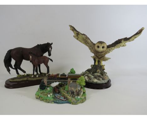 Danbury Mint train sculpture, Leonardo horse figurine and a Crosa Owl figurine, the tallest measures 25.5cm.