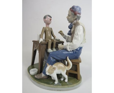 Lladro figurine The puppet painter Geppetto &amp; Pinocchio Model no 5396, (Missing paint brush and cat has been re glued) co