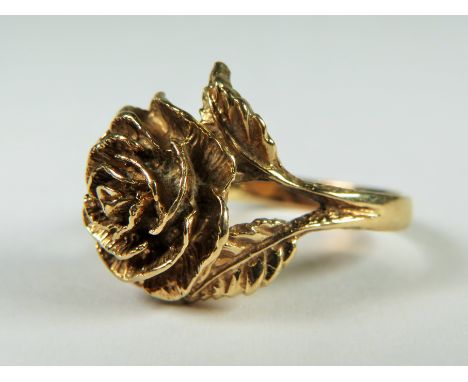 Unmarked ring (chem testing 9ct or higher) in a sculpted rose design.  Finger size 'K'   4.5g