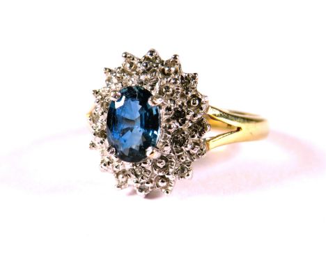 Very Pretty 9ct Yellow Gold ring set with a Central Oval shaped Sapphire and Tiny Diamonds surrounding.  Finger size 'N'  3.3