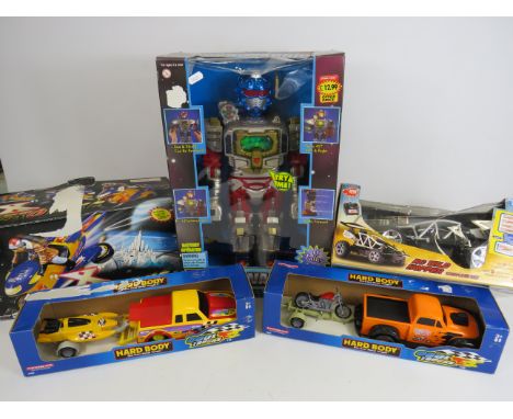 Selection of boxed childrens toys including a robot and remote control vehicle.