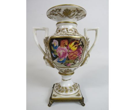 Meissen style twin handle vase sitting on brass feet, 16cm tall.