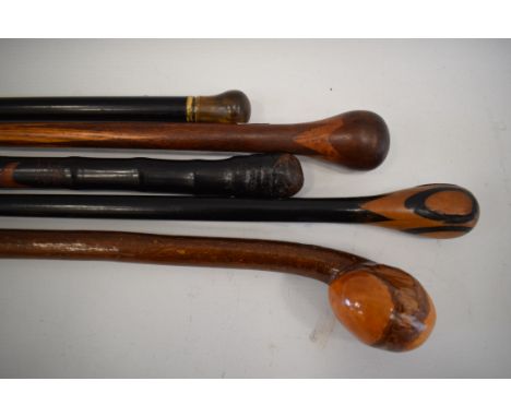 Five Interesting vintage walking sticks. See photos. 