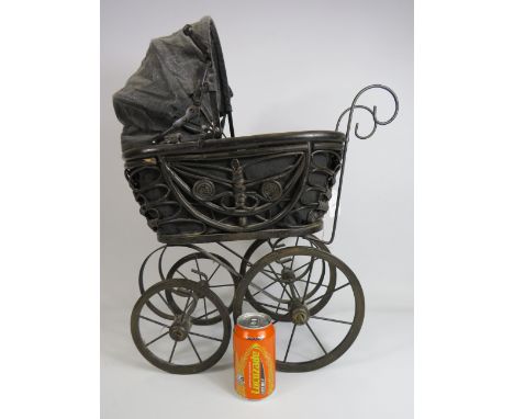Model Pram in a victorian style, 25" tall and 20" long.