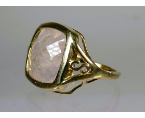 9ct Yellow Gold Ring set with a Square Cut Rose Quartz (12 x 12mm). Scrolled and pierced Shoulder.  Finger size K-5 to L   5.