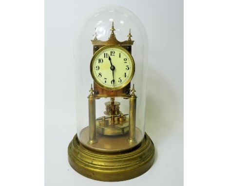 Gustav Becker Anniversary Clock, Serial Number 2264113. Appears to be in running order. Glass dome. No key present.  Approx 1