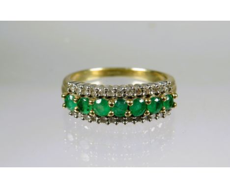 9ct Yellow Gold Ring set with Emerald Coloured CZ and Flanked by Twin rows of Melee Diamonds.  Finger size 'L-5 to M'   2.7g