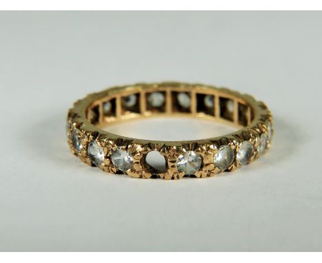 9ct Yellow Gold Stone set eternity ring (one stone missing. See photos)   Finger size 'N'   2.3g