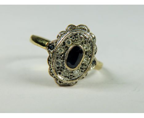 9ct Antique Style ring set with a central oval Sapphire with Diamond Surround.   Finger size 'L-5'   2.6g