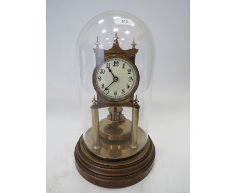 Gustav Becker Brass based Anniversary Clock under a Glass dome. Running order but no key present. Measures approx 12 inches t