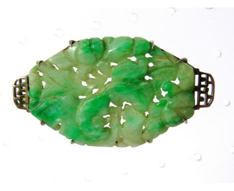 Very Pretty carved Jade or Jadeite Brooch set in a 9ct White Gold Mount which measures approx 45 x 25 mm. see photos. 