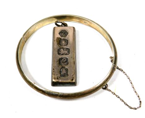 925 Silver Ingot Pendant plus a 925 Silver Bangle with safety Chain.  Total Weight 38.7g