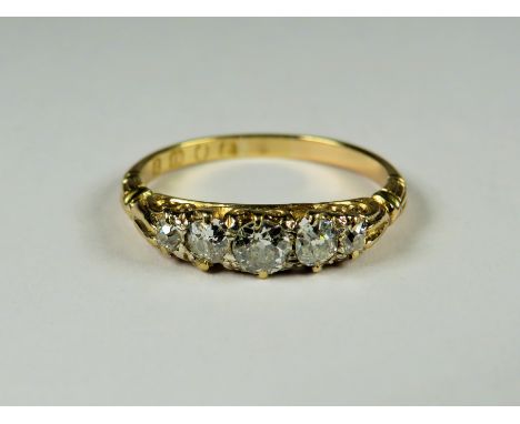 18ct  Yellow Gold Ring set with Five Diamonds which come to approx 0.5pts.   Finger size 'P'   2.7g