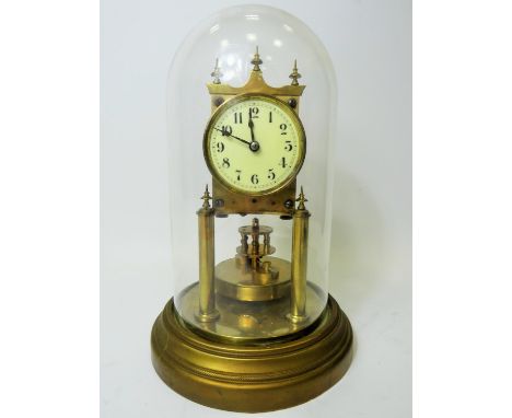 Gustav Becker Anniversary Clock, Serial Number 2248420. Appears to be in running order. Glass dome. No key present.  Approx 1